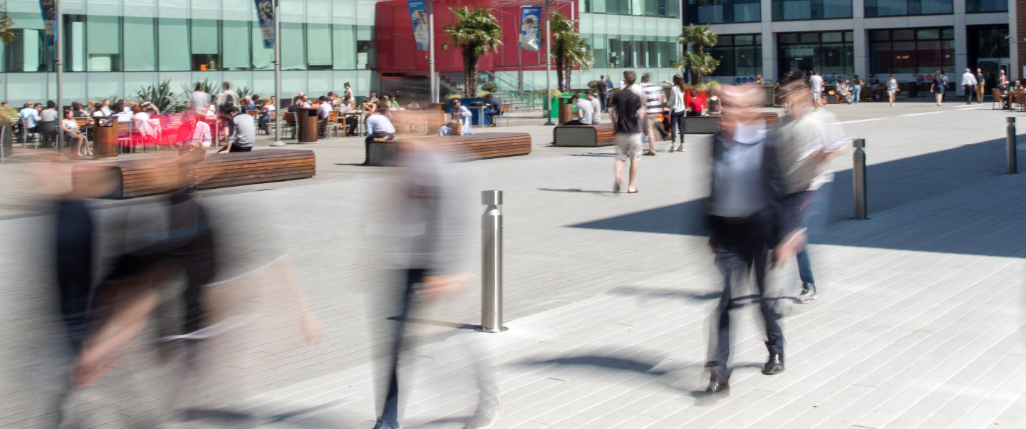 People walking on Dalby Court in Imperial's South Kensington campus