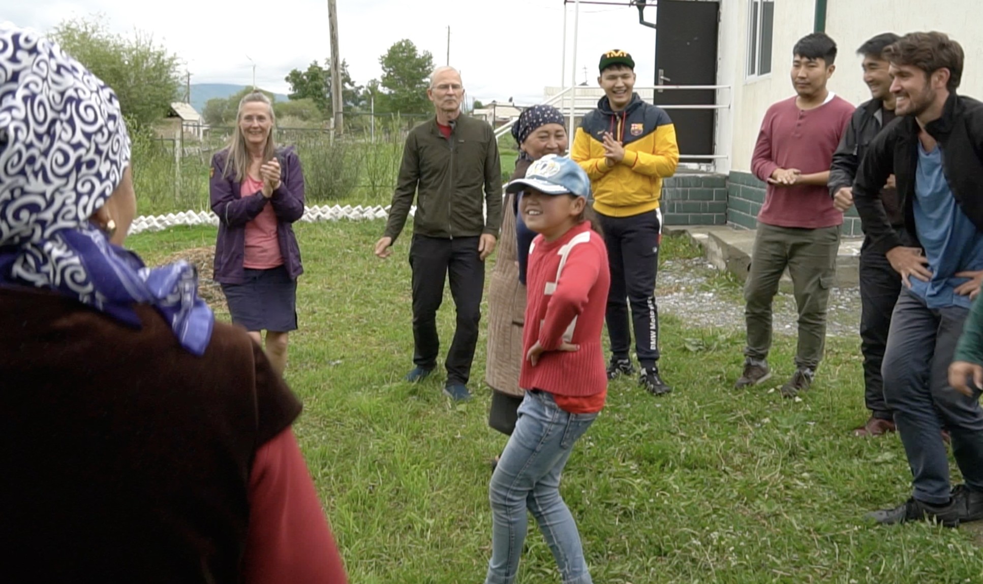 People dancing in a circle