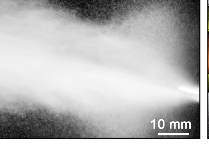 Image of dental aerosols spraying from mouth