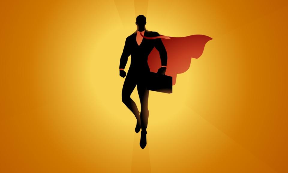 A silhouette style vector illustration of a superhero businessman levitating mid-air with waving cape and sun in the background
