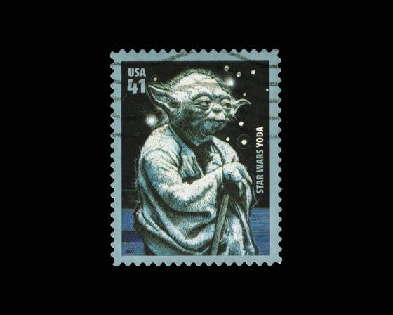 A commemorative postage stamp featuring Yoda
