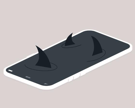 A school of shark fins above a mobile phone screen surface