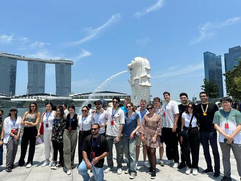 Students pose for photo in Singapore outside