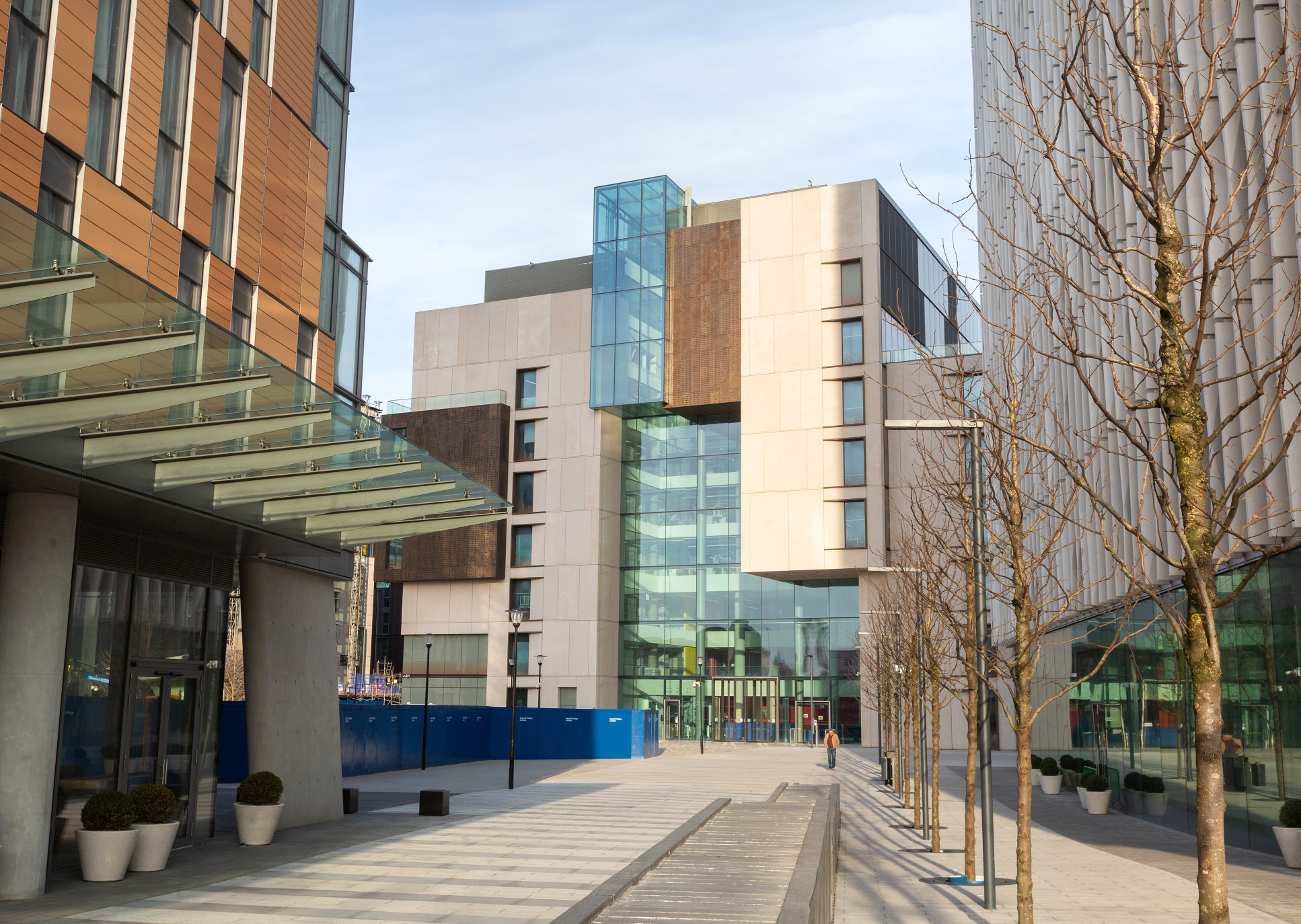 A view to the Molecular Sciences Research Hub at the White City Campus. Also visible is Eighty Eight Wood Lane, the residential tower (pictured on the left), and the Sir Michael Uren Hub (pictured on the right).