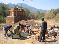 Mixing concrete in front of the towers