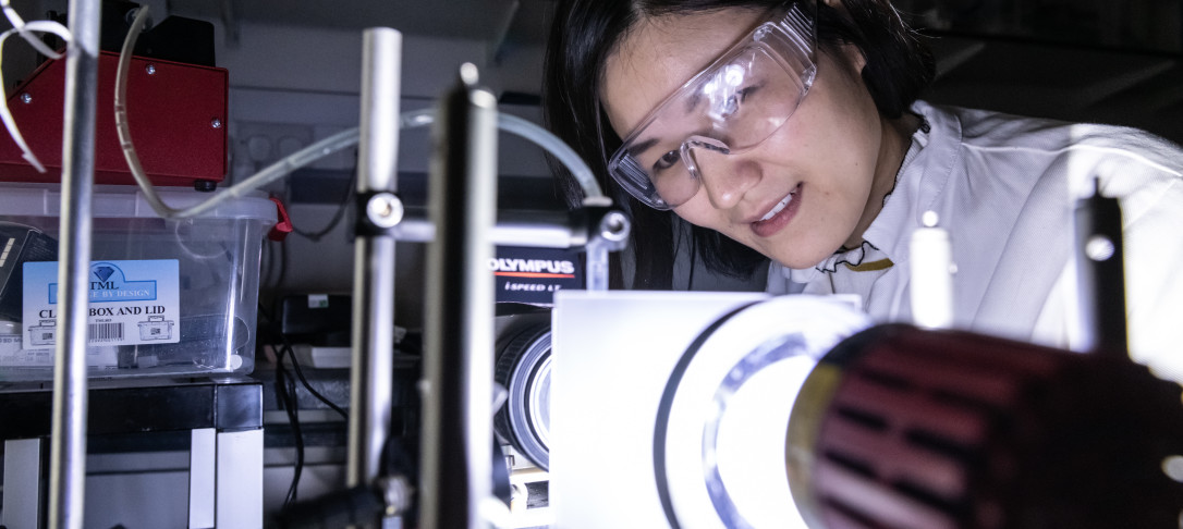 An Earth Science and Engineering PhD student research group member working in the Mineral Lab.