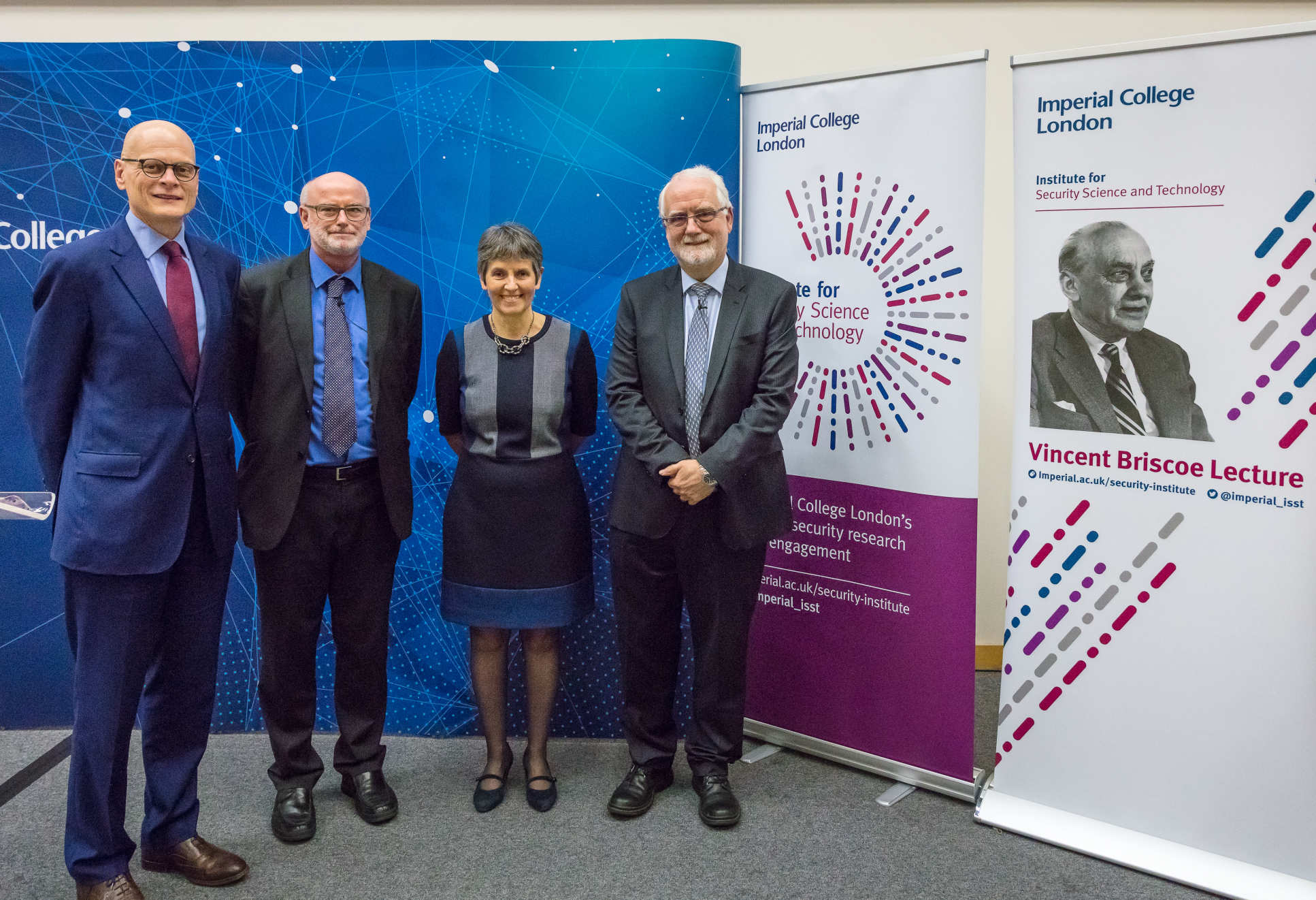 Photo of Cressida with Imperial's Provost and Heads of the ISST, in front of Vincent Briscoe lecture branding