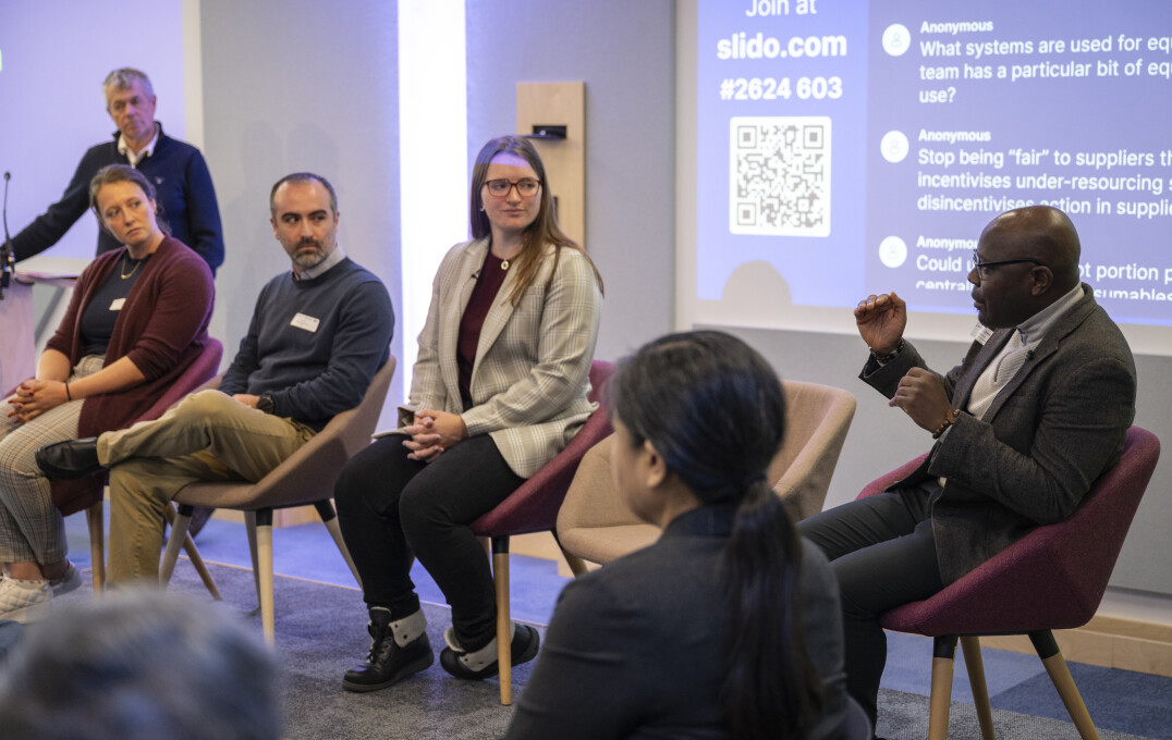 A panel speaking at the symposium