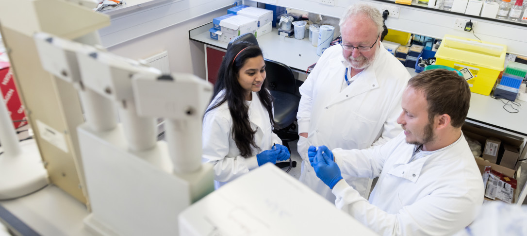 researchers in lab