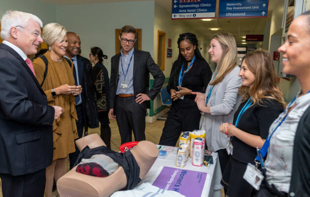 Phil and team are shown a simulation of a pregnant woman by research midwives.