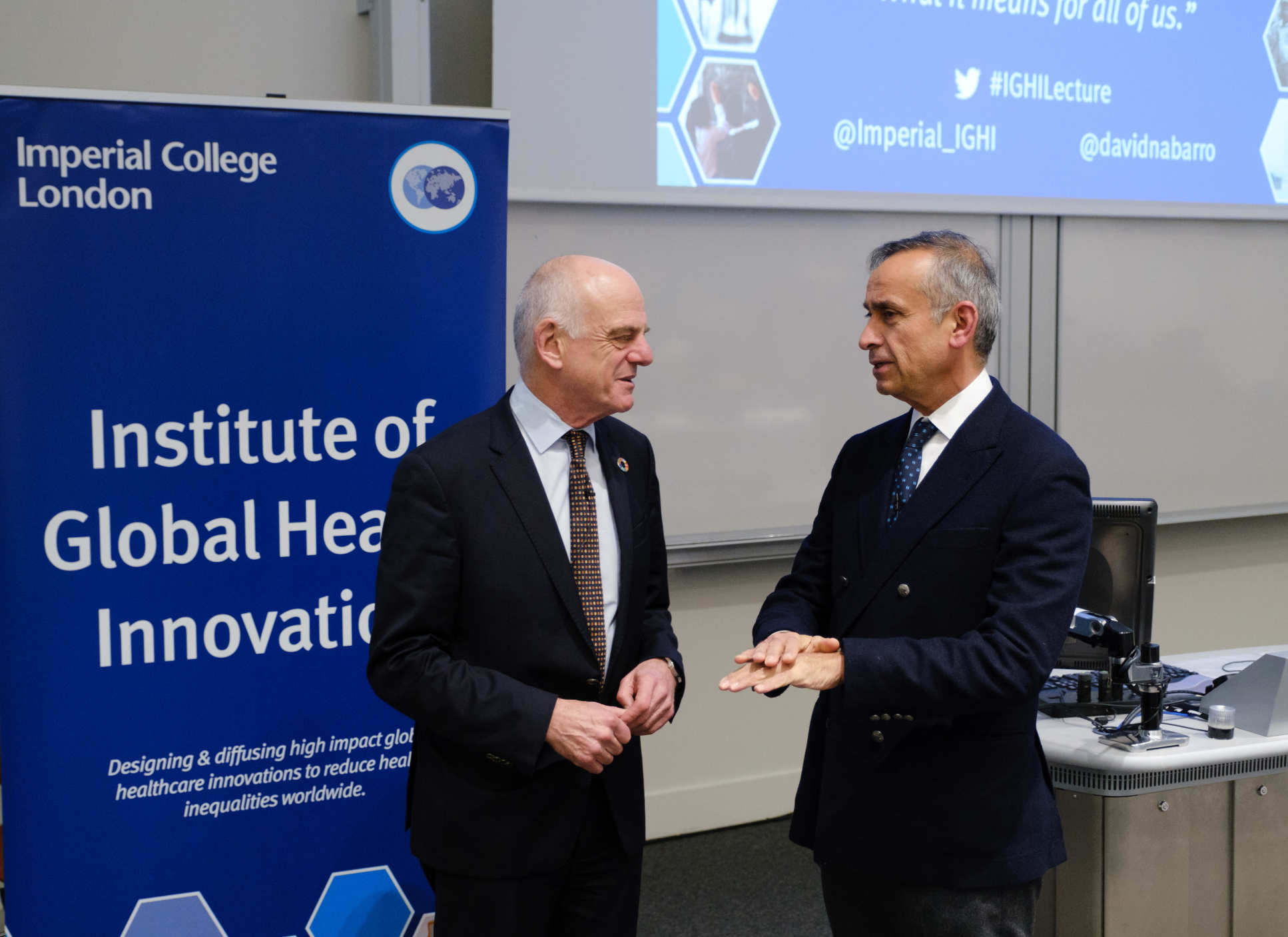 Dr Nabarro and Prof Darzi in discussion at a lecture
