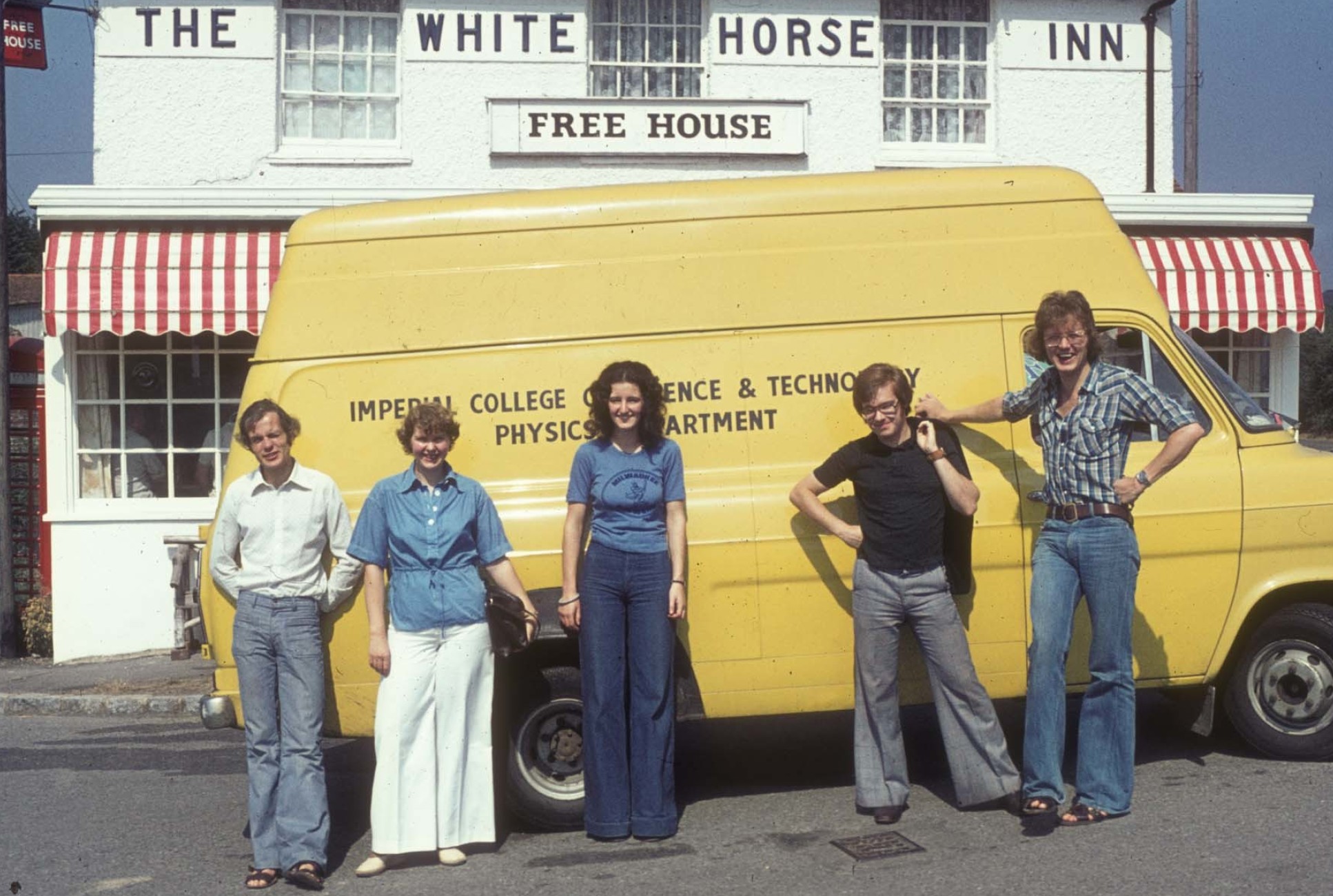 Paul and colleagues with the department van