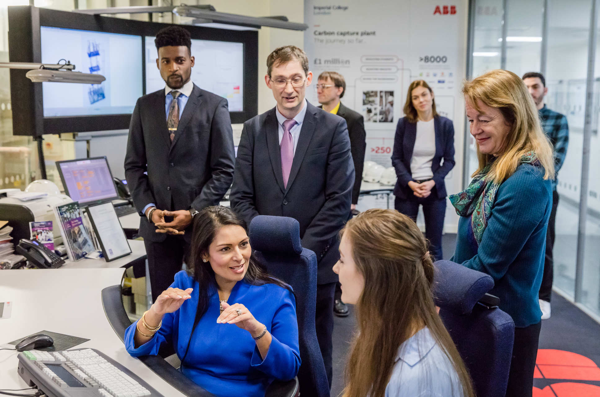 Home Secretary Priti Patel, President Alice Gast and researchers and students in the Carbon Capture Pilot Plant