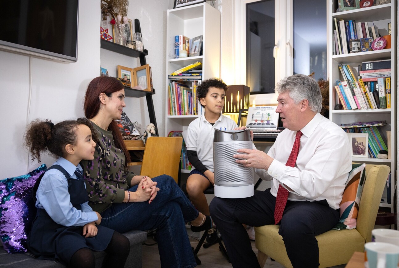 Imperial's Professor Frank Kelly meeting a family participating in the WellHome study.