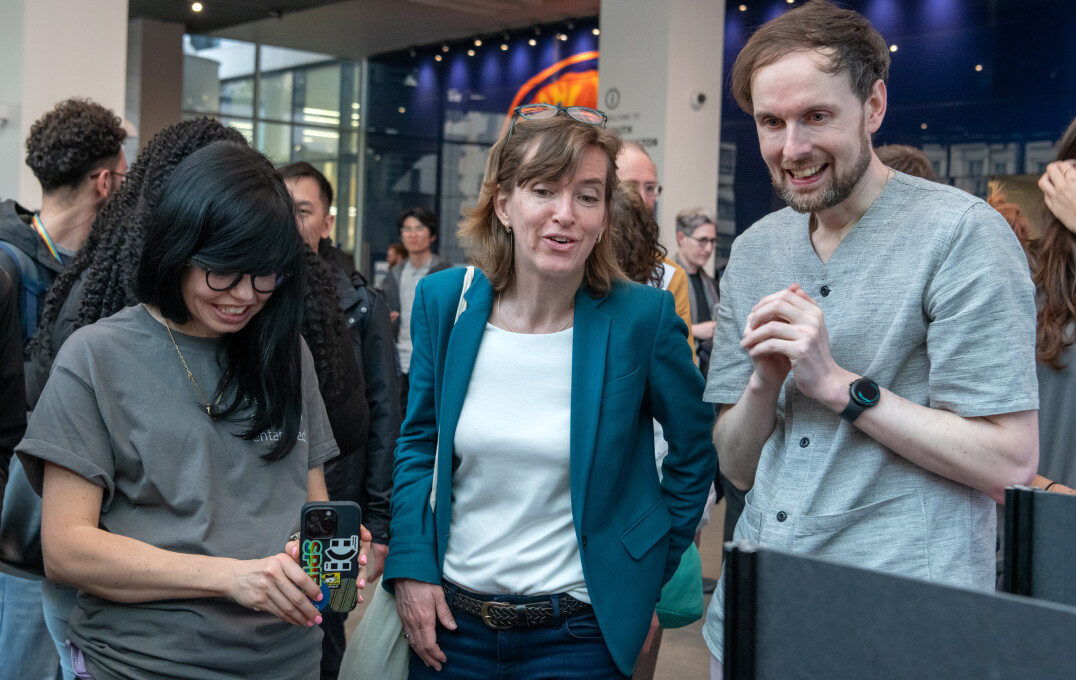 Dr Jess Wade, Professor Sandrine Heutz and Dr James Millen react to a live demonstration at the event