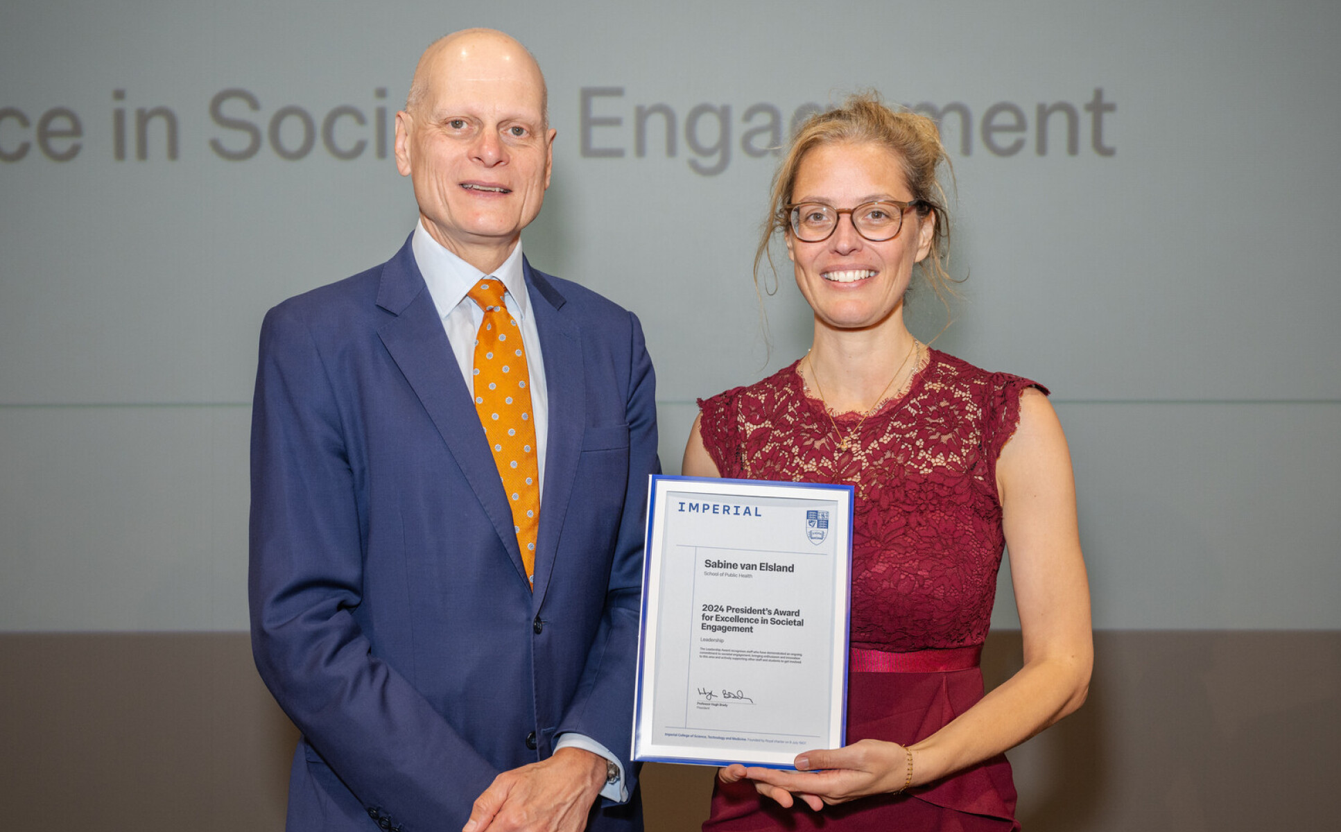 Sabine van Elsland receiving her award from Provost Ian Warmsley