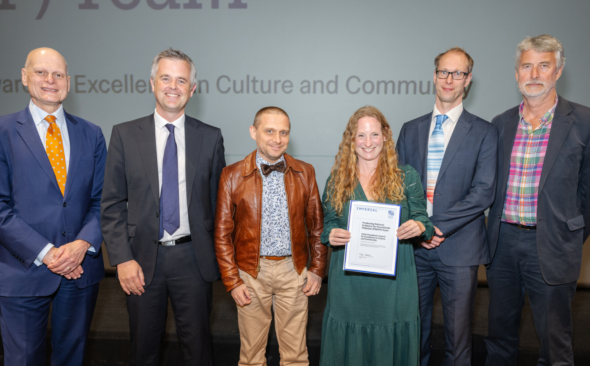 roducing Rational Evidence for The Parasiticide Pollution (PREPP) Team (Leon Barron second from the left) receive their award from Provost Ian Warmsley