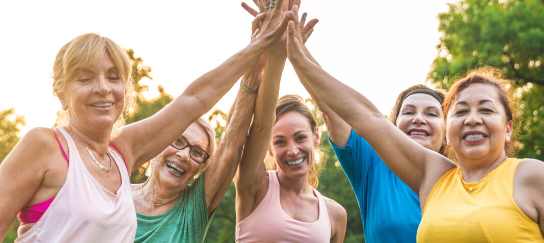 Group of women high fiving