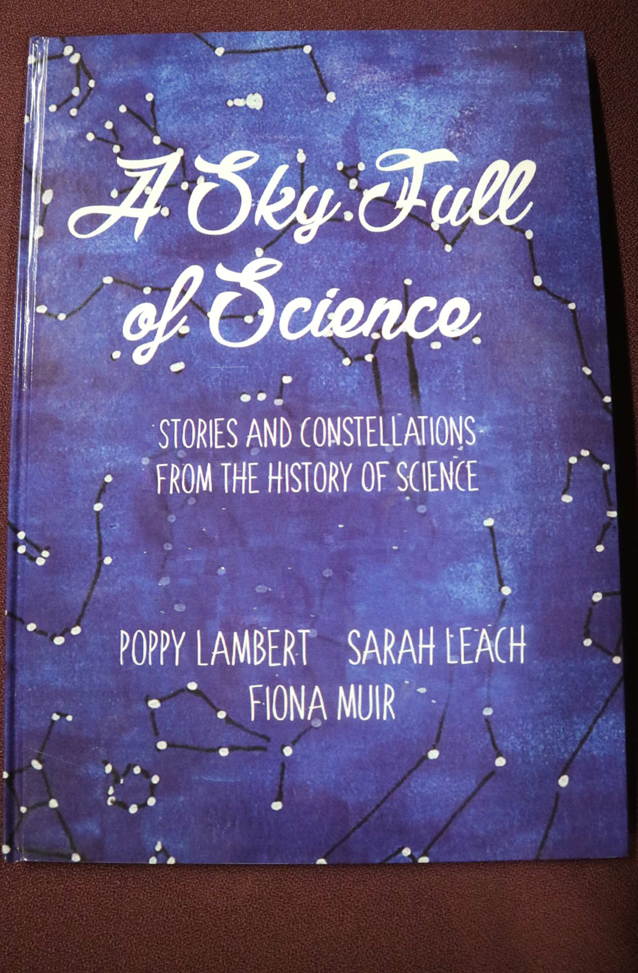A book with the title 'A sky full of science'