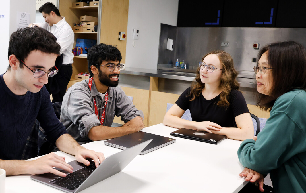 Researchers and attendees discussing