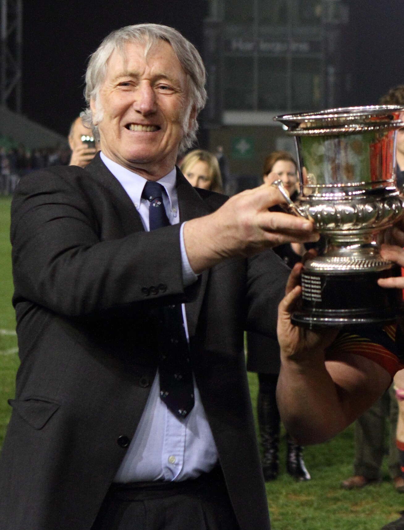 JPR Williams presents the cup at the 2014 JPR Williams Cup match, part of the Imperial Varsity fixtures