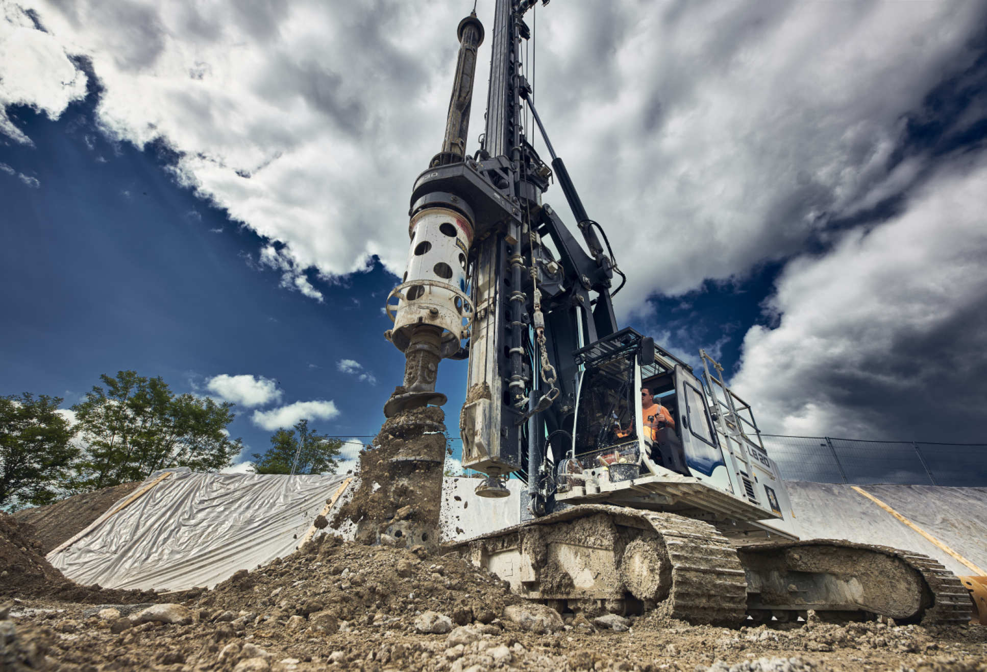 Giant drilling machine entering the ground