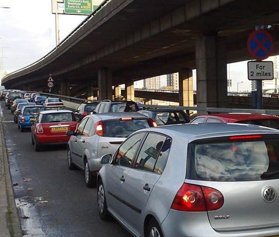 Image shows a traffic jam under a flyover