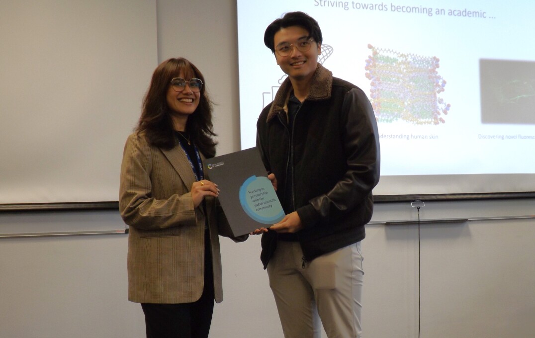 Chris Pang, MRes student, receiving his prize for Best Poster from the Royal Society of Chemistry