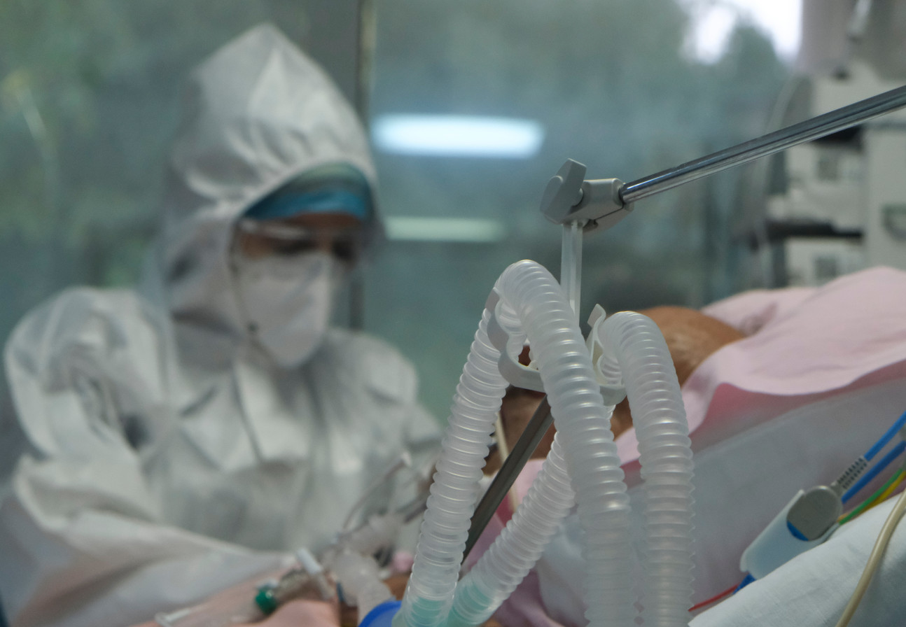 A doctor in a COVID-19 ward wearing protective clothing