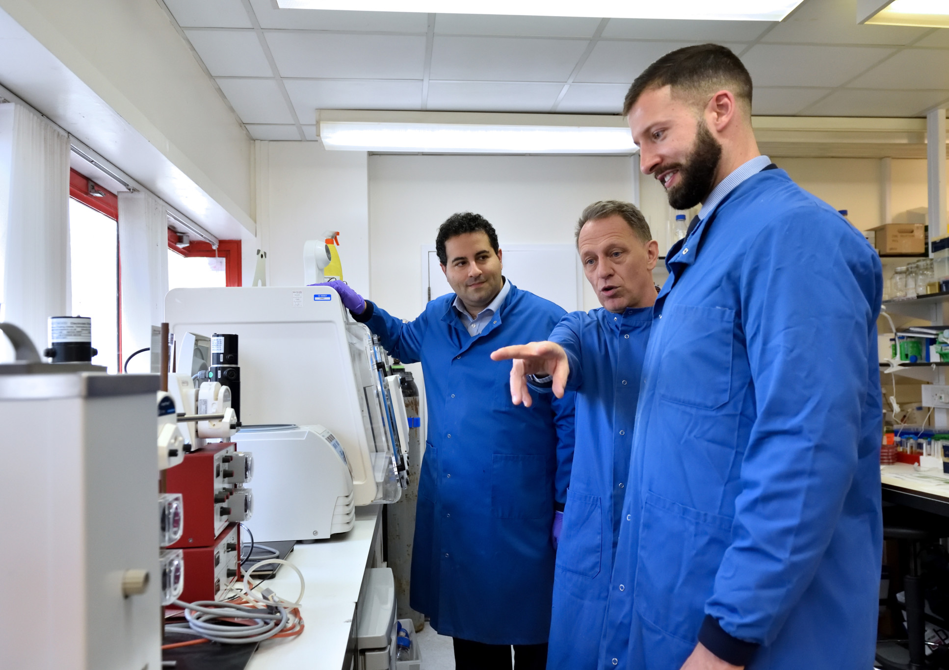 Dr Ben Mullish, Professor Julian Marchesi and Dr James McIlroy in a lab