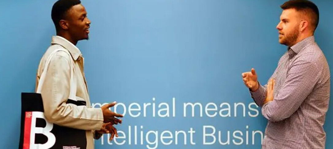 Image of two men in discussion in front of text that reads Imperial means Intelligent Business