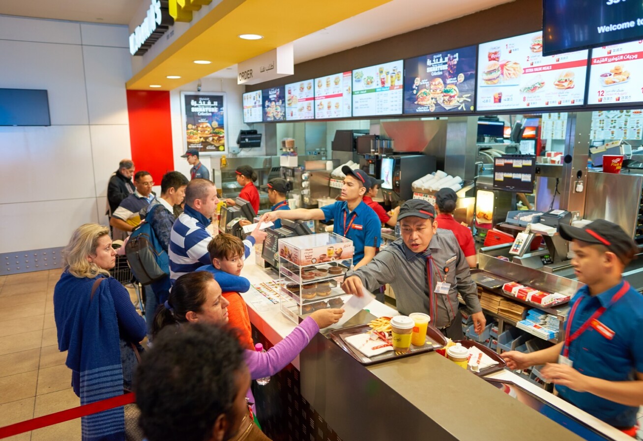 Customers being served at a fast food outlet.