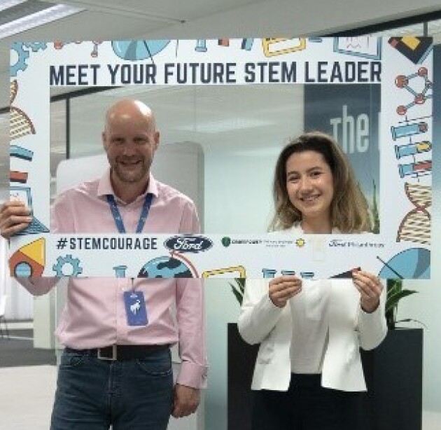 Photo of student and Ford CEO in a frame saying 'meet your future STEM leader'. eader