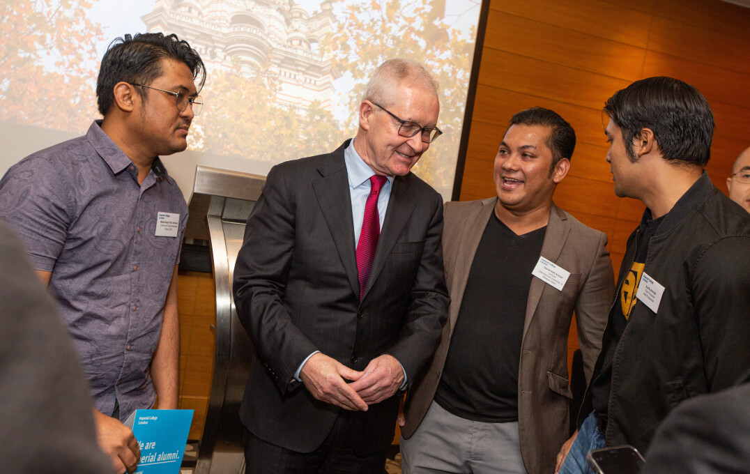 President Professor Hugh Brady alongside Imperial alumni at the Alumni Reception in Malaysia