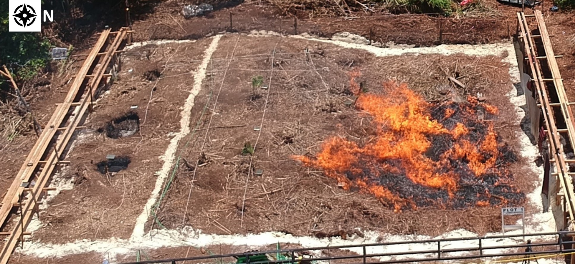 Photo showing a field experiment in Indonesia. Fire burns on 10m x 10m of peatland area.