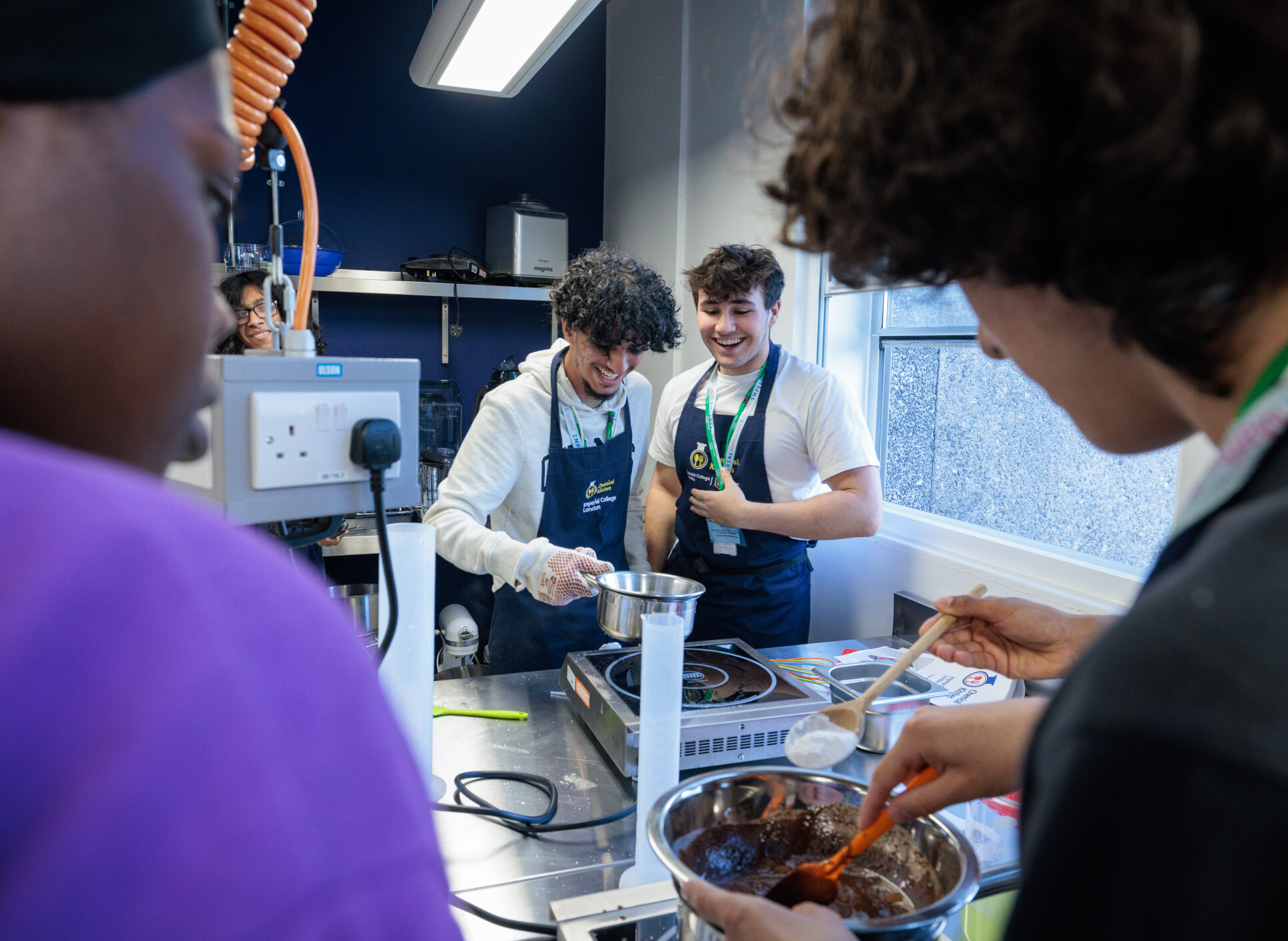 Students cooking in the chemical kitchen