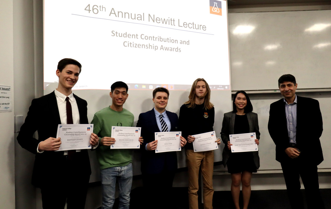 Group of students holding award certificates