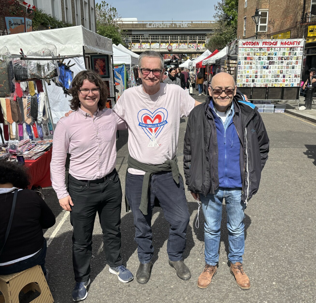 Elliott, Piers and Nick at a market