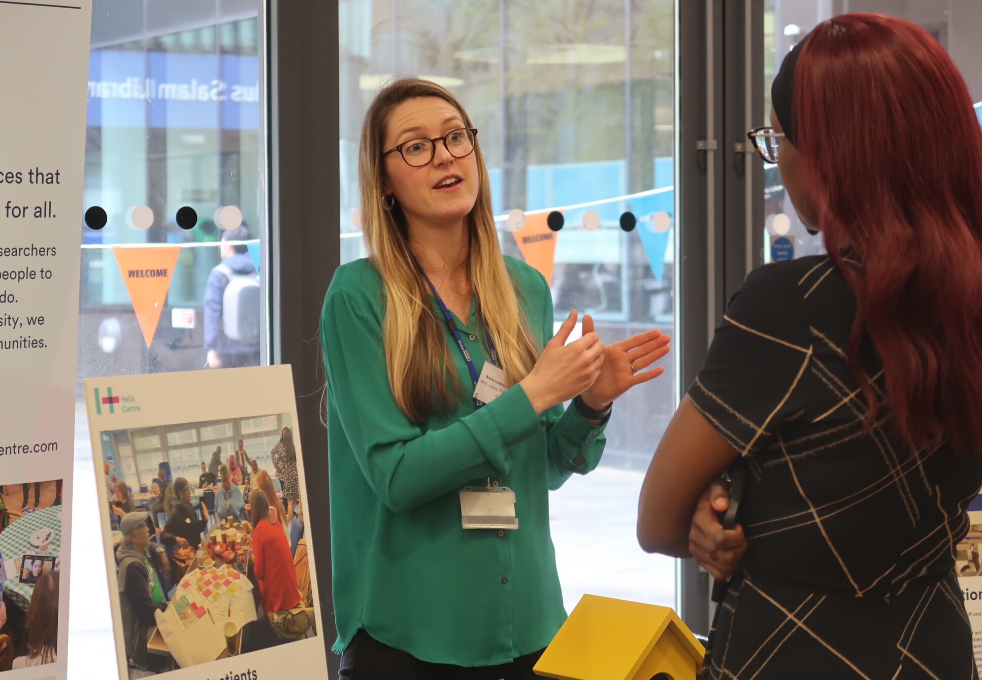 Anna Lawrence-Jones from the Helix Centre discussing her team’s work. Credits: Holly Merton/IGHI.