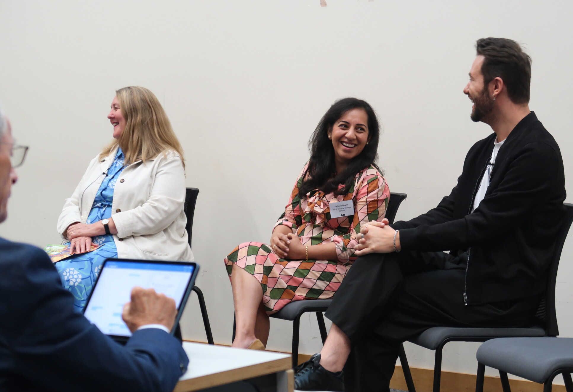 Panellists seated at fron of lecture theatre