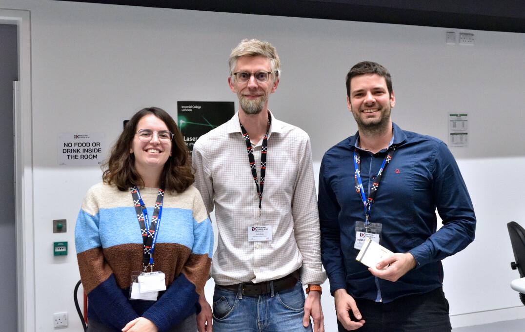 Professor Nick Jones with the winners of the research poster competition - Dr Sara Veneziale and Dr Manolo Perez.