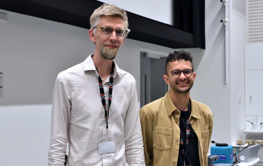 Professor Nick Jones with the winner of the flash talk competition, Dr Marcus Ghosh. 