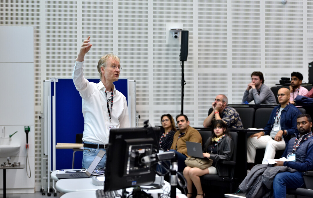 Professor Max Welling giving a keynote lecture. 