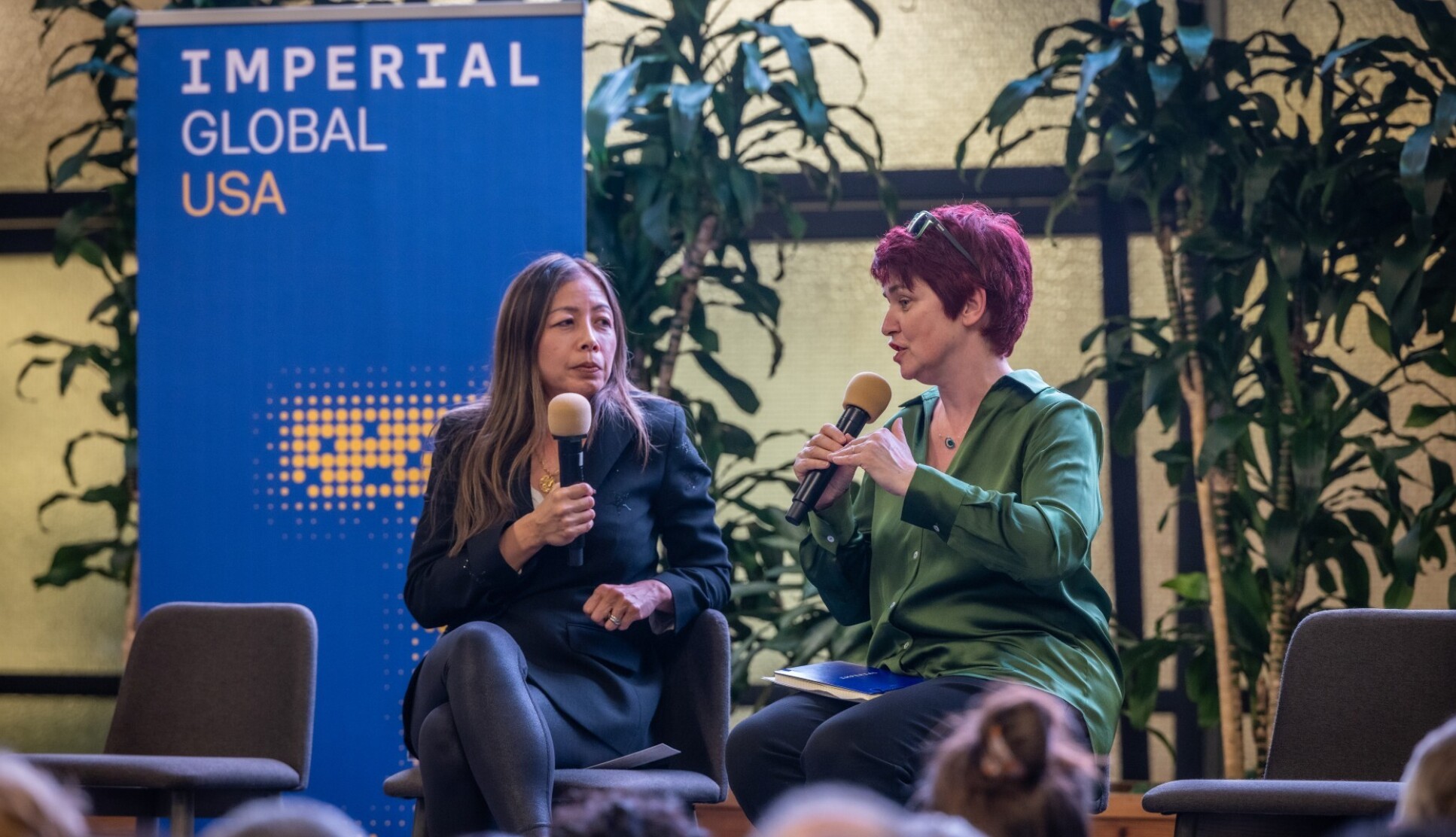 Professor Mary Ryan speaking to Wendy Tan White at the launch of Imperial Global USA.