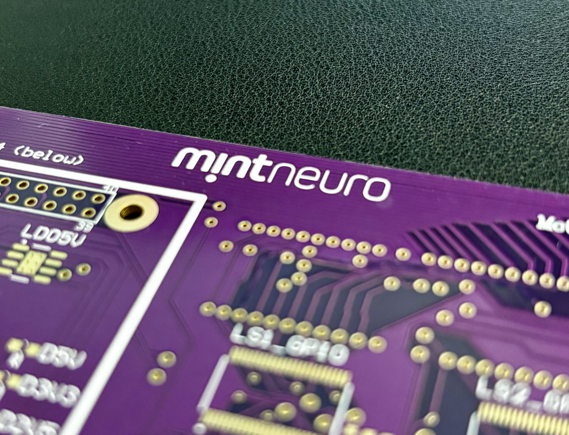 A circuit board with the the word Mintneuro printed on it