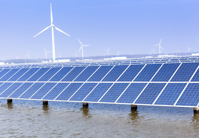 Solar panels and wind turbines in water