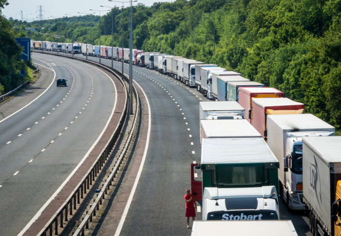 Photo depicting a queue of lorries on the M20