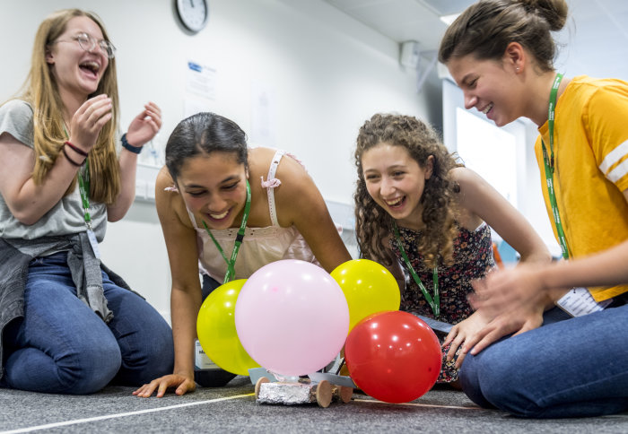 Students enjoy a challenge during a summer school workshop