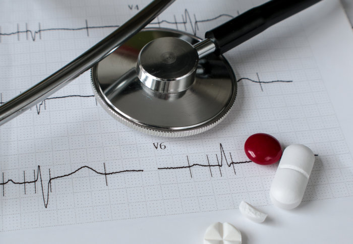 Concept of heart rate with with cholesterol- and blood-pressure-lowering medications