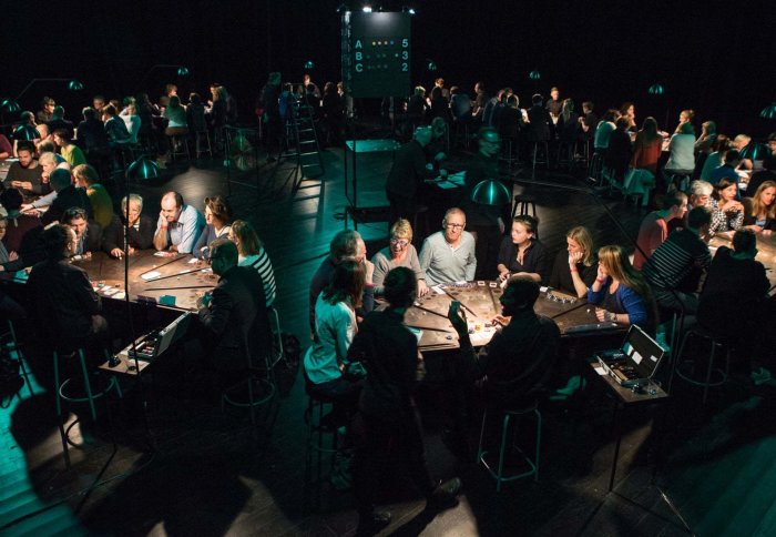 Theatre-goers at casino tables for interactive theatre production, LIES